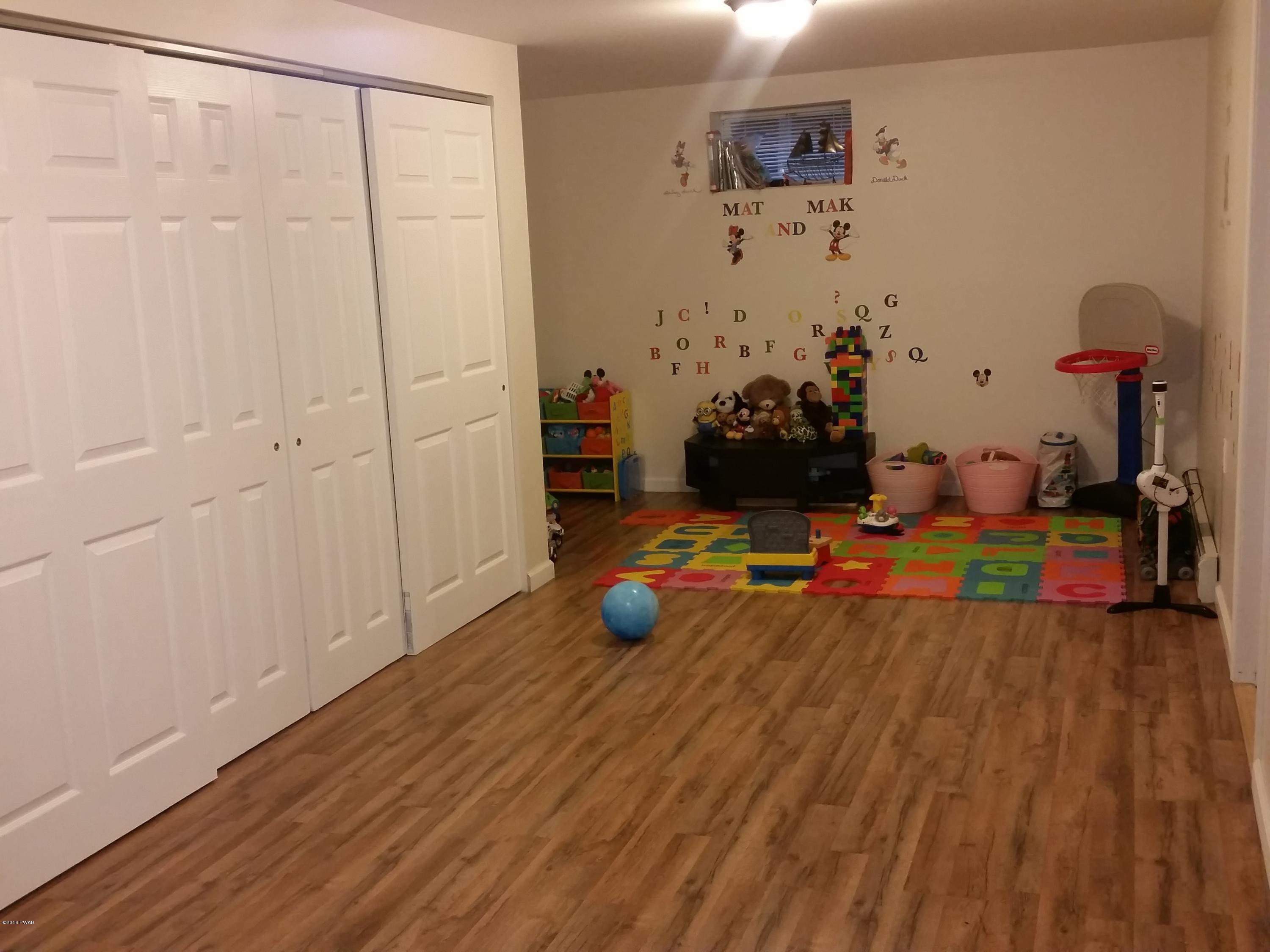 171 Chipmunk Road Bushkill, PA 18324 - Photo 25 of 27 family room 1
