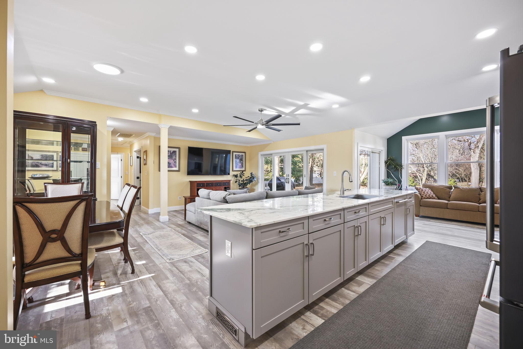 568 Village Road East Princeton Junction, NJ 08550 - Photo 12 of 43 a large kitchen with a table and chairs