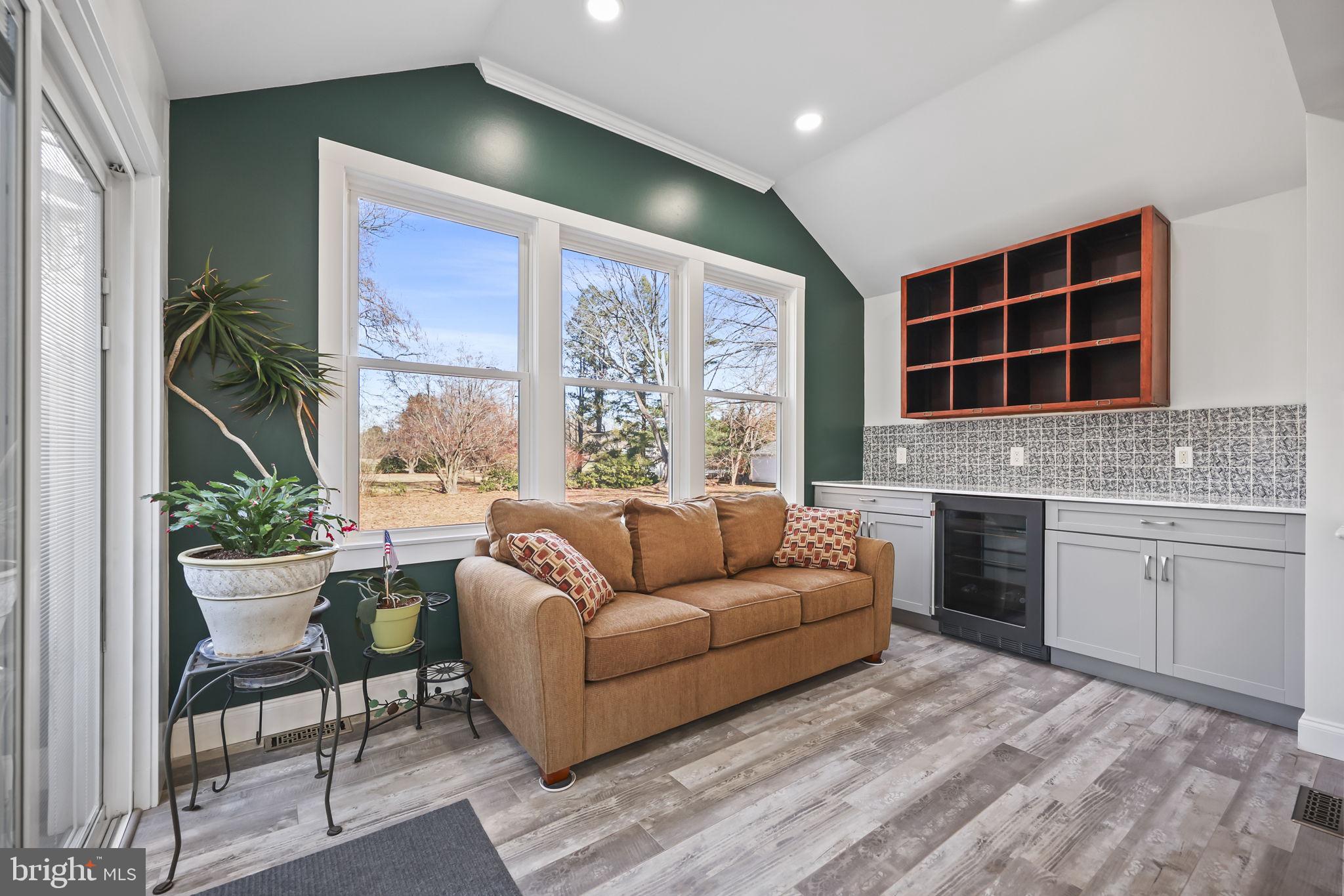 568 Village Road East Princeton Junction, NJ 08550 - Photo 13 of 43 a living room with furniture and a large window