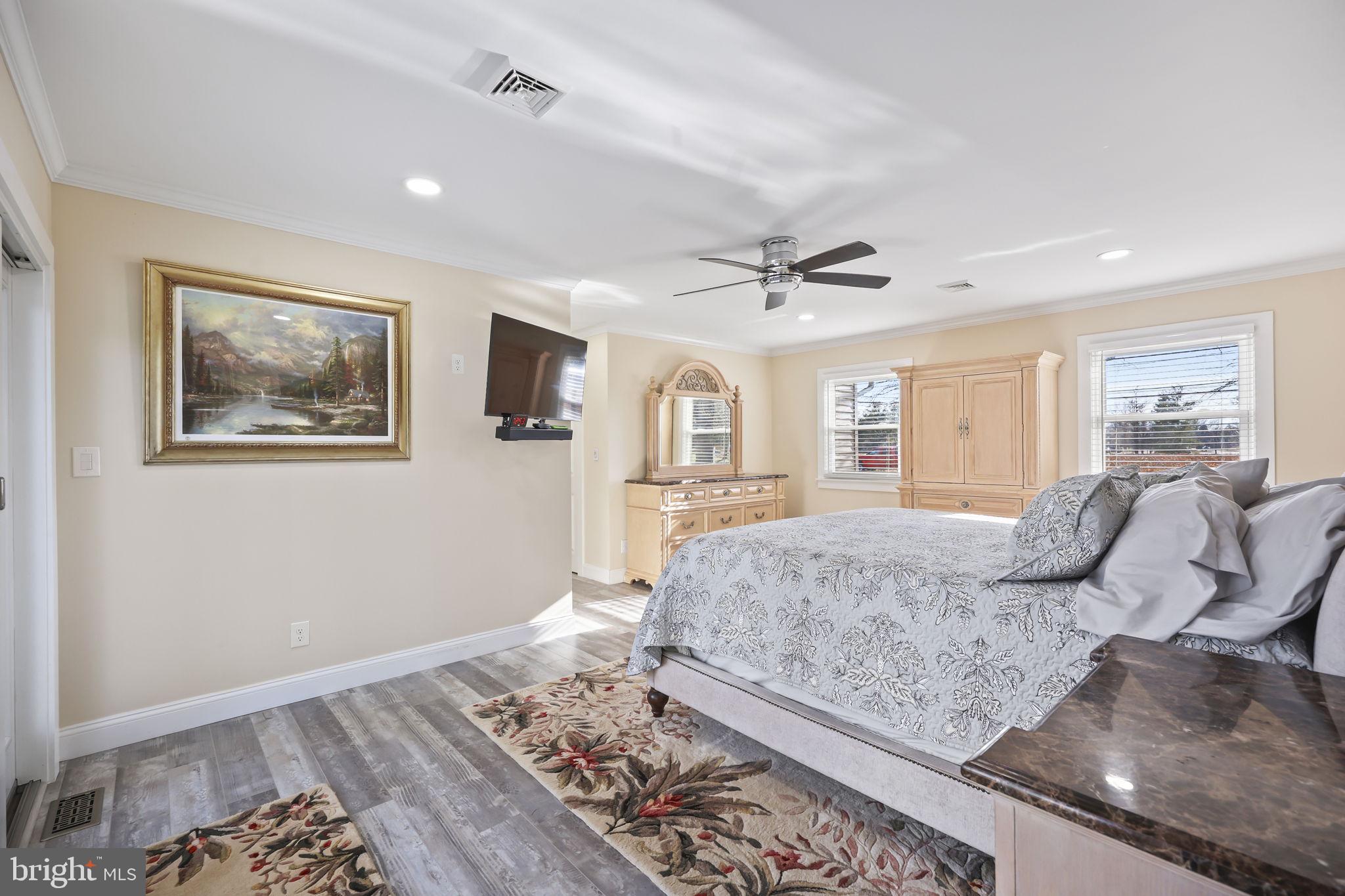 568 Village Road East Princeton Junction, NJ 08550 - Photo 24 of 43 a living room with furniture and a dresser