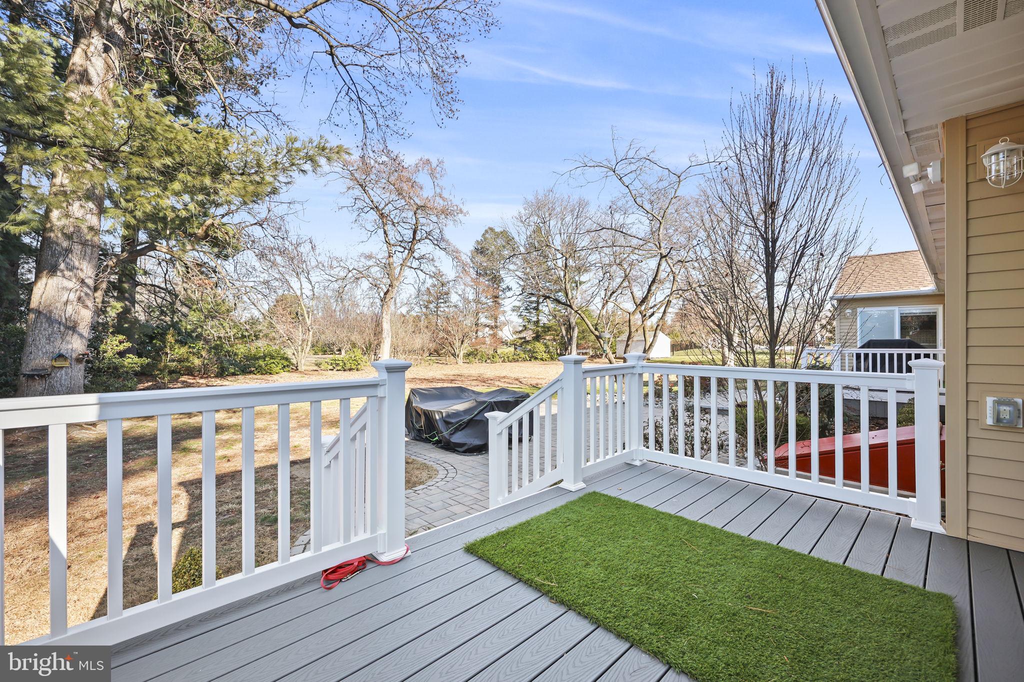 568 Village Road East Princeton Junction, NJ 08550 - Photo 31 of 43 a view of a deck with a yard
