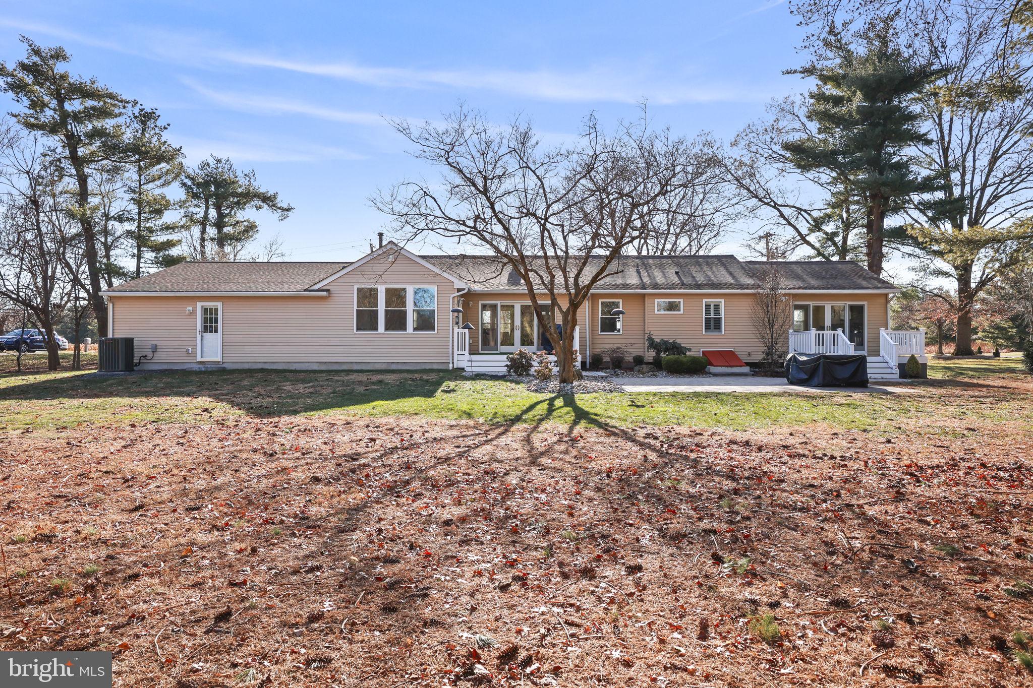568 Village Road East Princeton Junction, NJ 08550 - Photo 38 of 43 a view of house with outdoor space and swimming pool