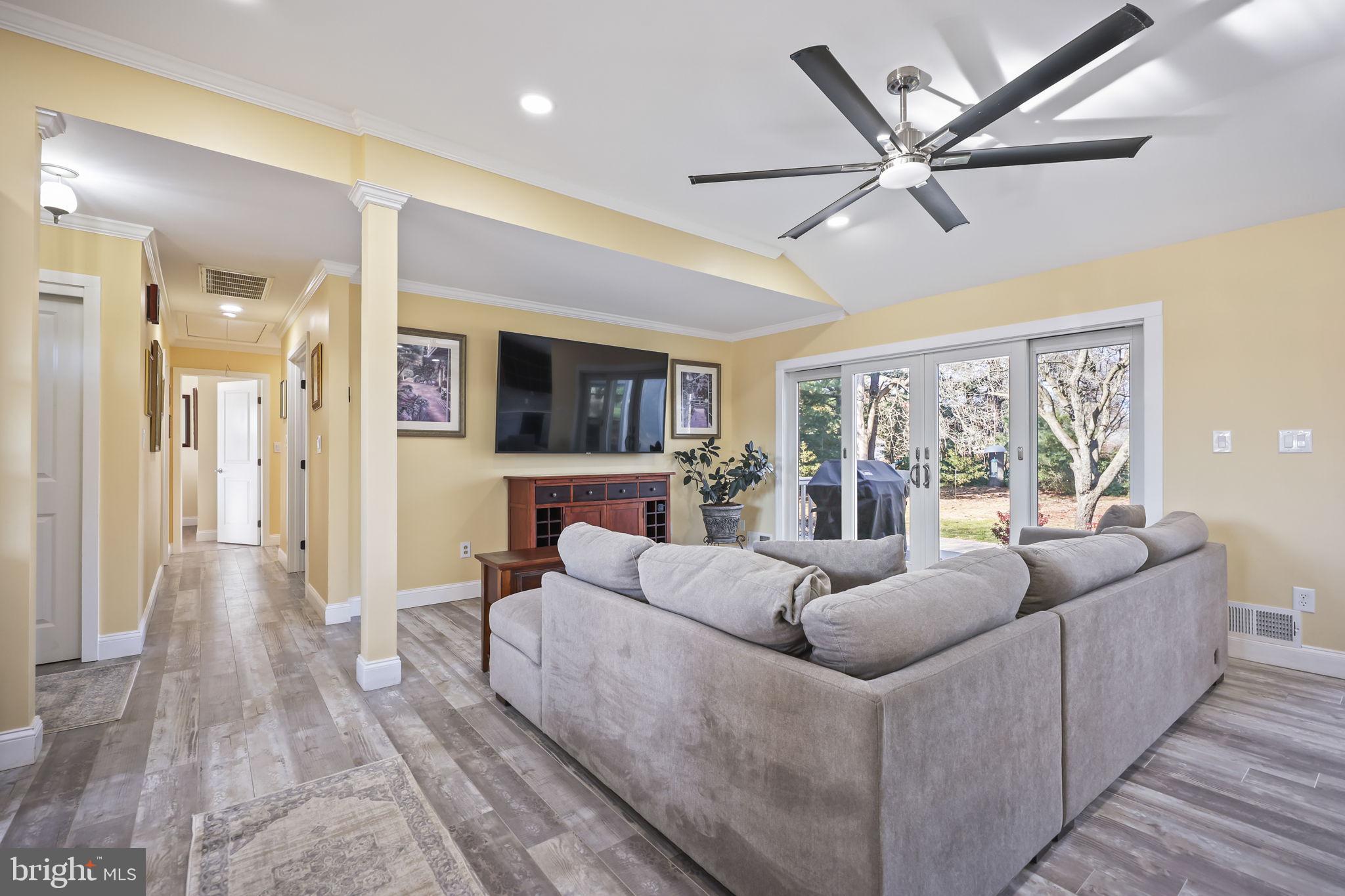 568 Village Road East Princeton Junction, NJ 08550 - Photo 5 of 43 a living room with furniture and a large window