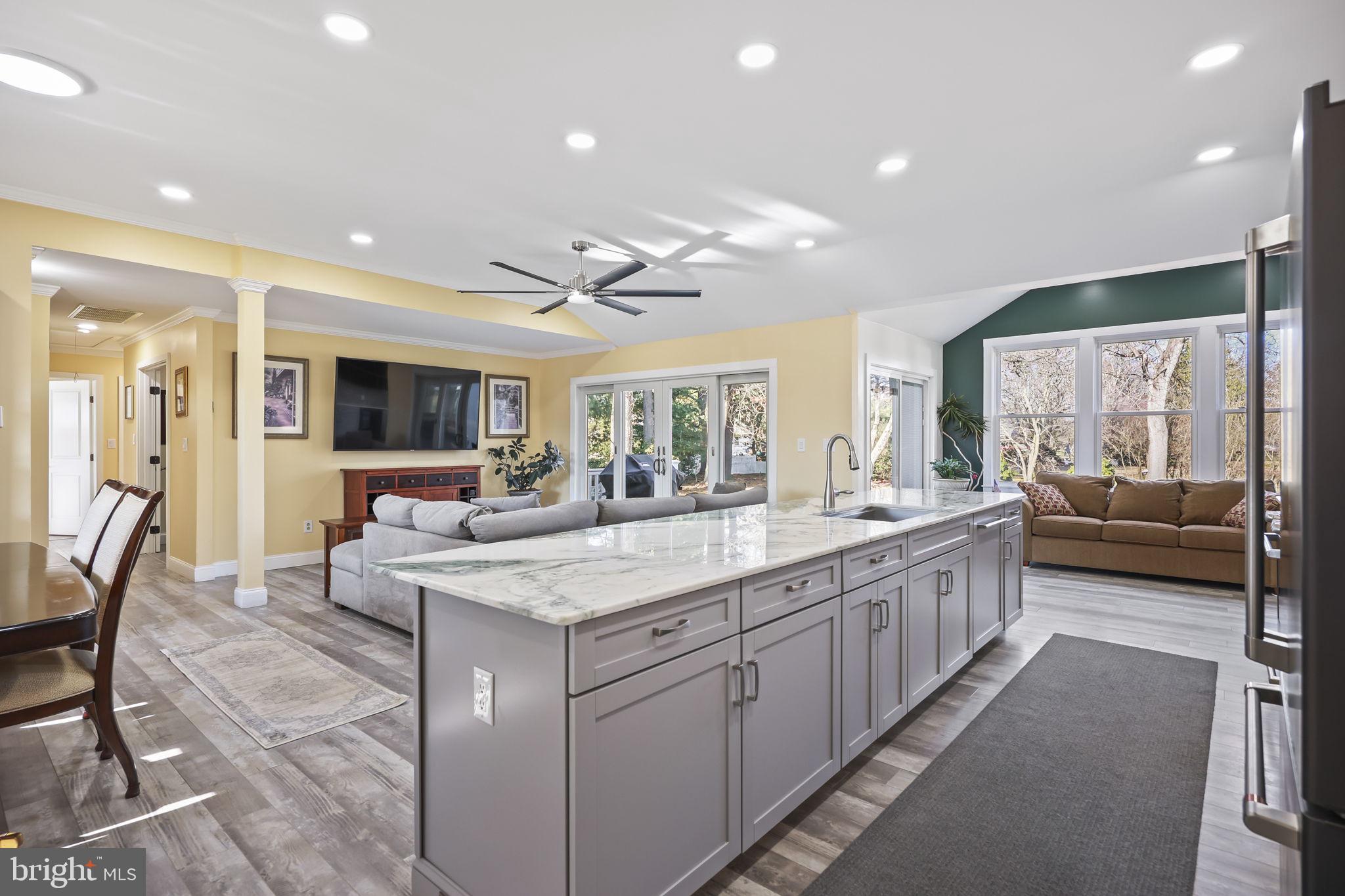 568 Village Road East Princeton Junction, NJ 08550 - Photo 10 of 43 a large kitchen with kitchen island a large island in it
