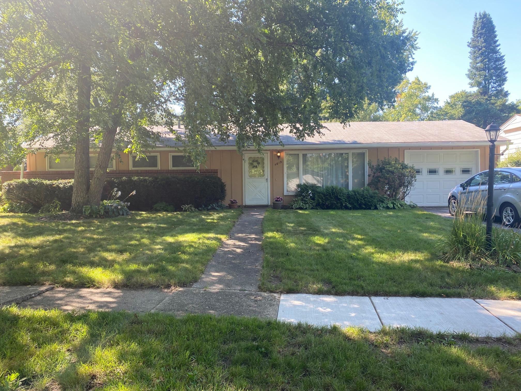 4619 Highcrest Road Rockford, IL 61107 - Photo 1 of 9 a view of backyard with green space