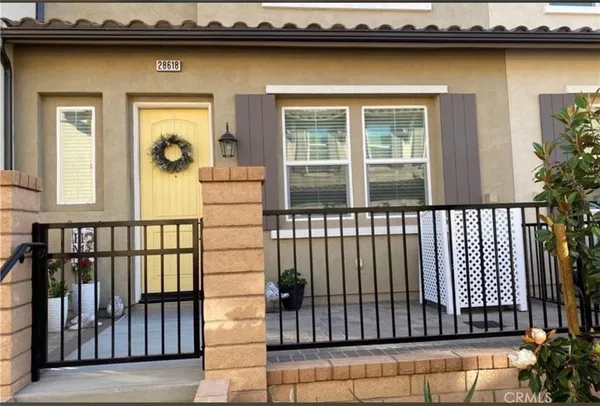 a view of a balcony from a house