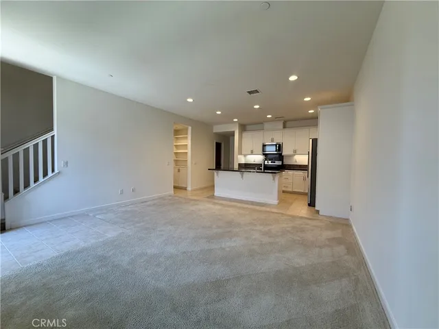 a view of a kitchen with a sink