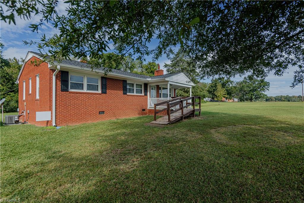 3099 County Farm Road Gibsonville, NC 27249 - Photo 4 of 44 From under the tree