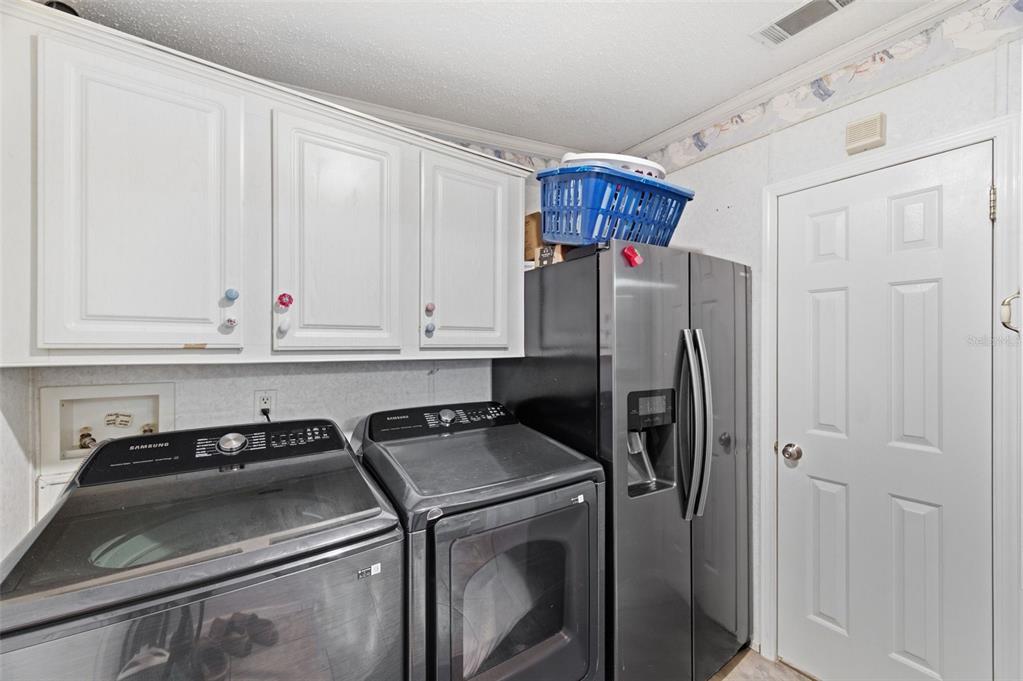 9634 Pat Street Hudson, FL 34669 - Photo 46 of 73 a kitchen with stainless steel appliances granite countertop a refrigerator and a stove