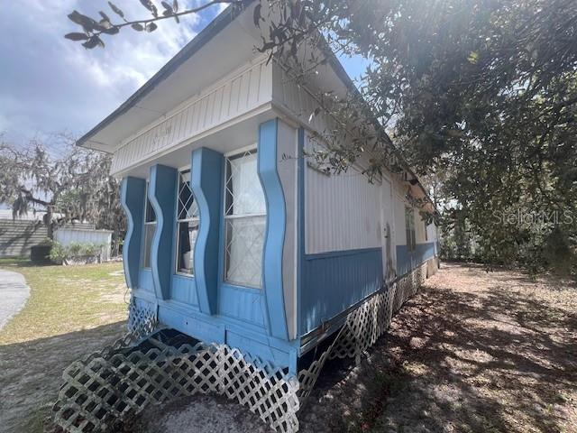 9634 Pat Street Hudson, FL 34669 - Photo 57 of 73 a view of a house with a yard