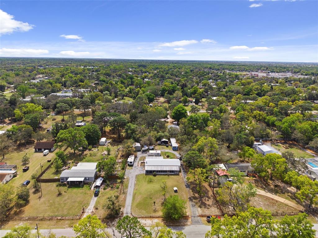 9634 Pat Street Hudson, FL 34669 - Photo 66 of 73 an aerial view of residential houses with outdoor space