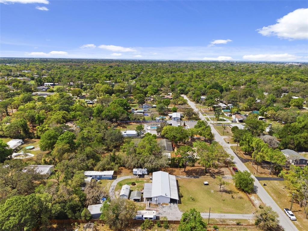 9634 Pat Street Hudson, FL 34669 - Photo 68 of 73 an aerial view of residential houses with city view
