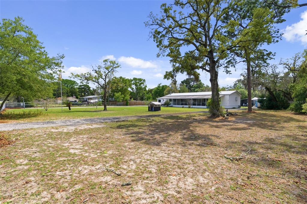 9634 Pat Street Hudson, FL 34669 - Photo 7 of 73 a view of a park with large trees