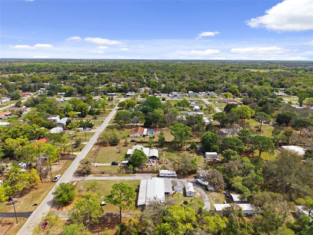 9634 Pat Street Hudson, FL 34669 - Photo 72 of 73 an aerial view of residential houses with city view