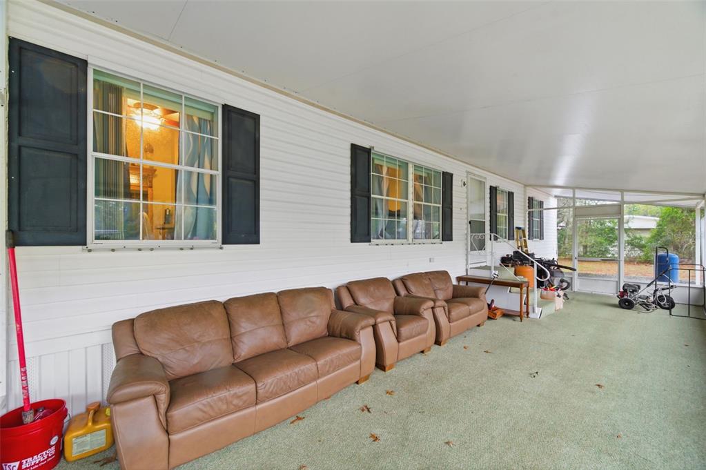 9634 Pat Street Hudson, FL 34669 - Photo 9 of 73 a living room with furniture and a window