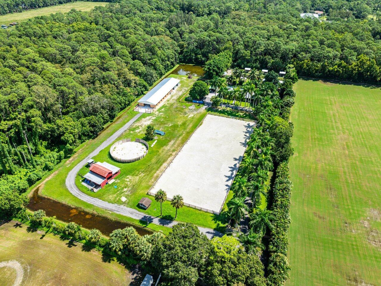 1068 D Road Loxahatchee Groves, FL 33470 - Photo 1 of 59 057-1068DRoad-Loxahatchee-FL-33470-SMALL