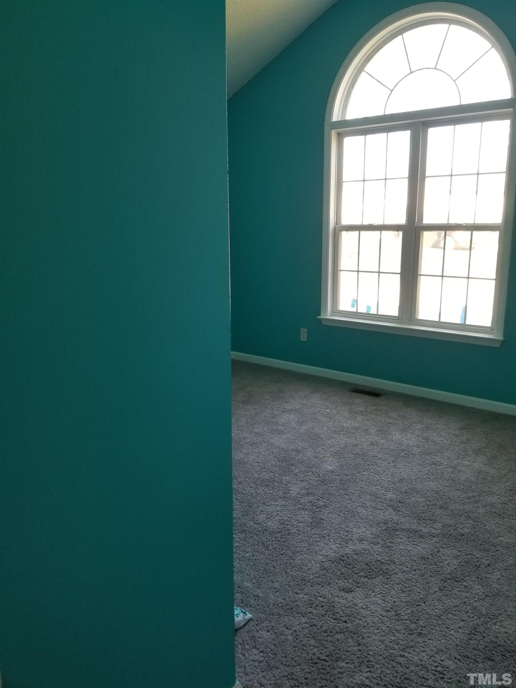 6408 Silver Spring Court Willow Spring, NC 27592 - Photo 10 of 11 an empty room with a window