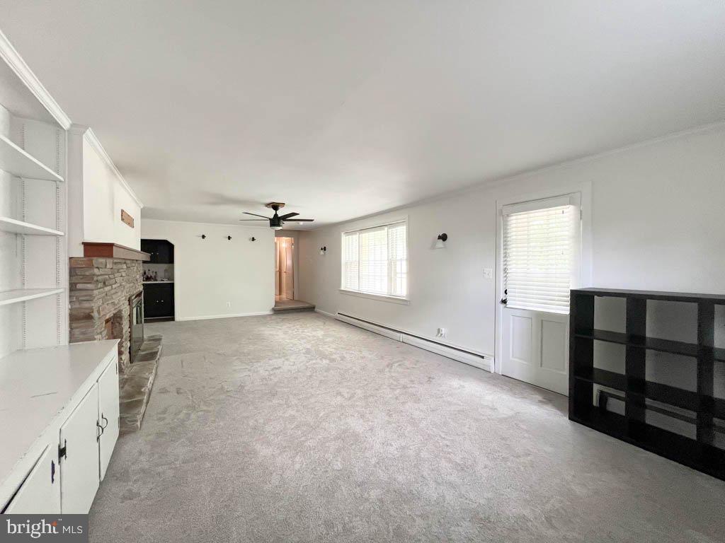 124 Deacon Road Fredericksburg, VA 22405 - Photo 12 of 48 a view of an empty room with a fireplace