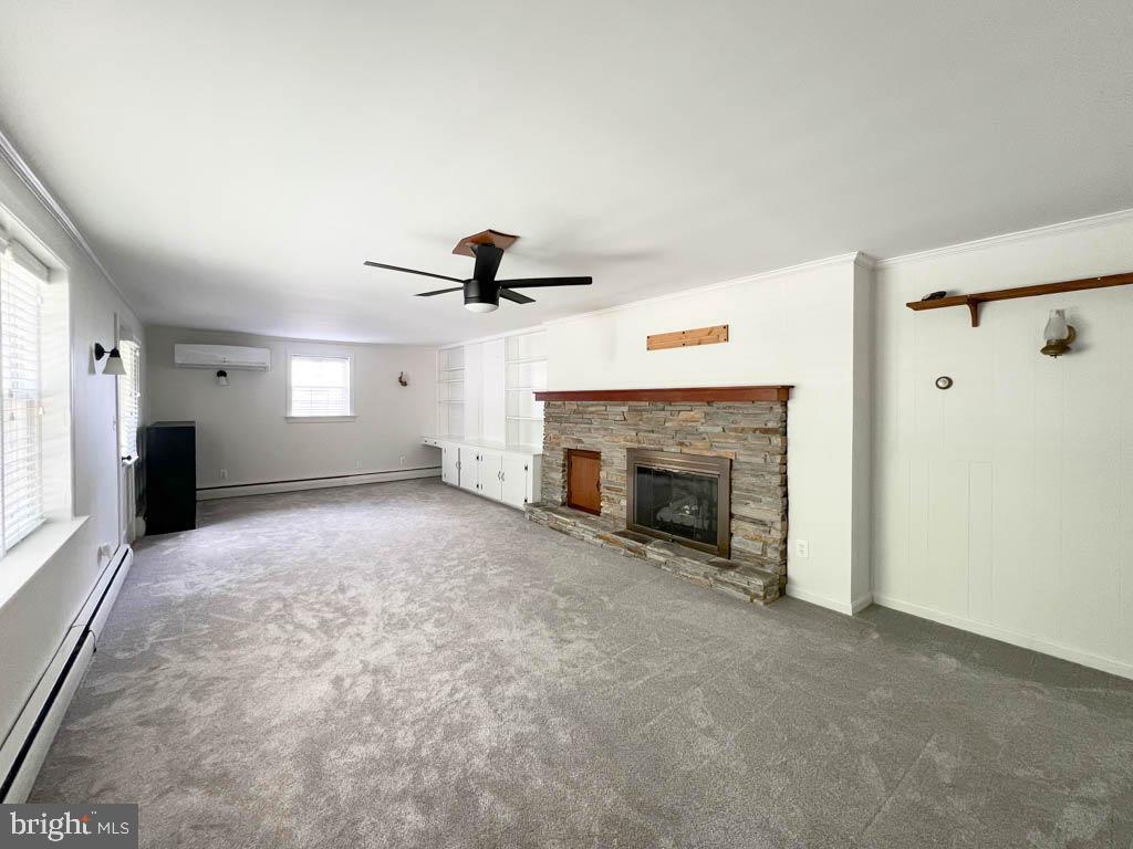 124 Deacon Road Fredericksburg, VA 22405 - Photo 13 of 48 a view of a livingroom with a fireplace and window