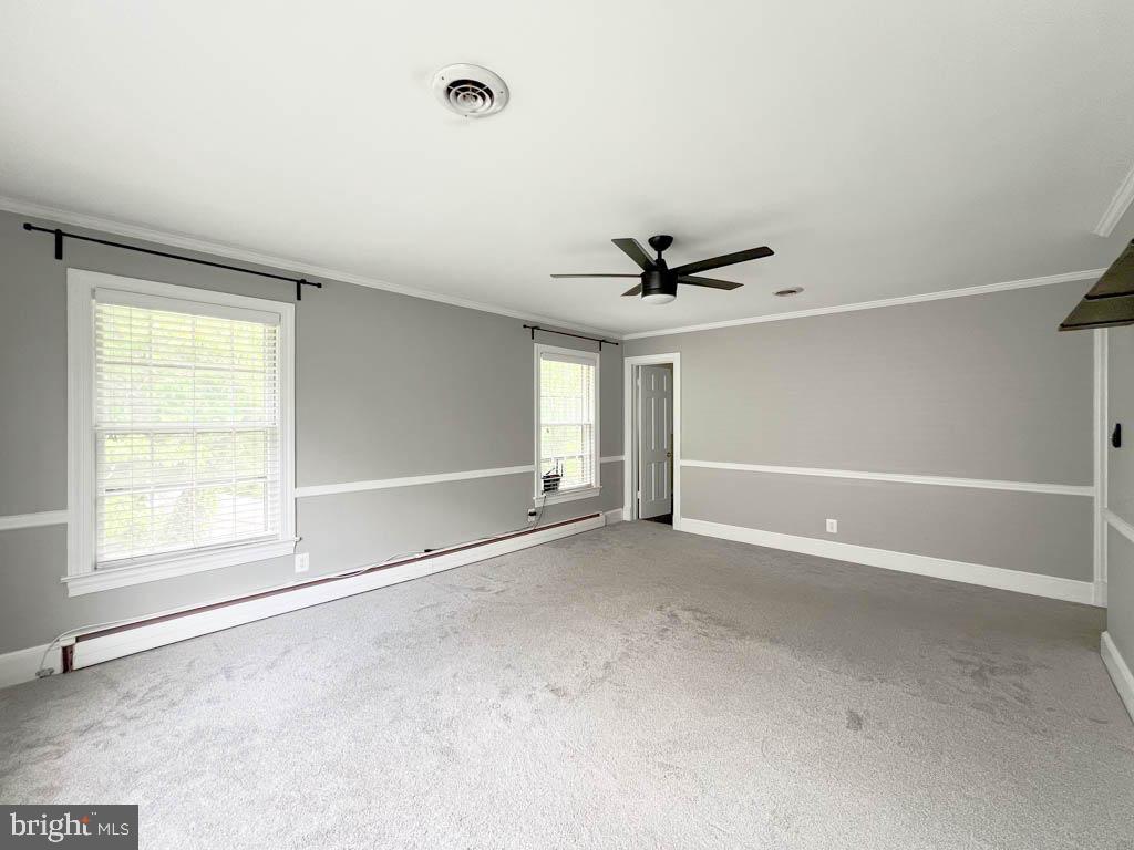 124 Deacon Road Fredericksburg, VA 22405 - Photo 16 of 48 an empty room with a empty space and windows