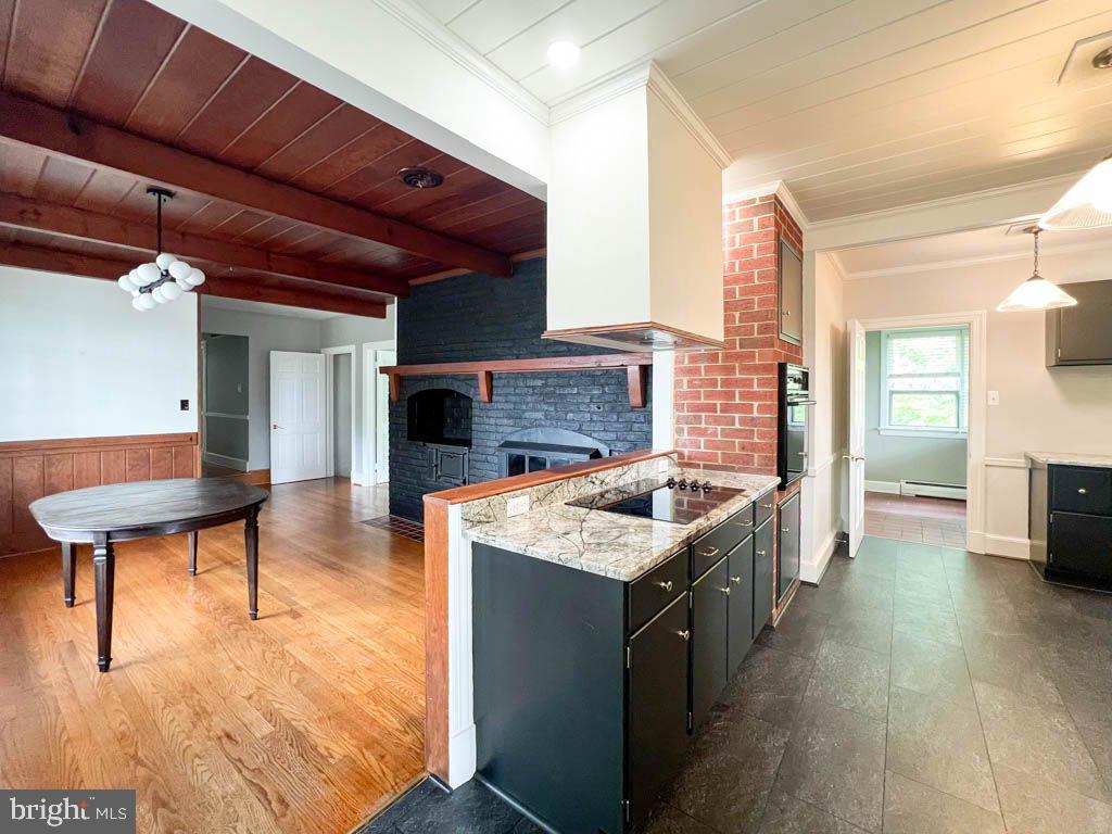 124 Deacon Road Fredericksburg, VA 22405 - Photo 2 of 48 a kitchen with a stove and a refrigerator