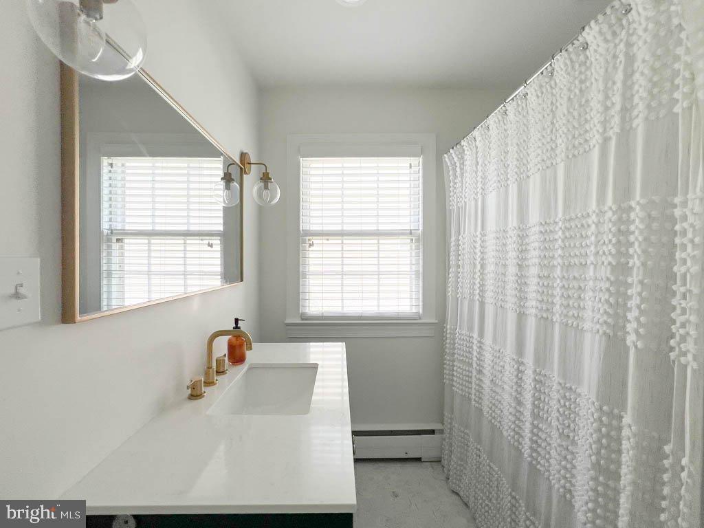 124 Deacon Road Fredericksburg, VA 22405 - Photo 21 of 48 a bathroom with a bathtub and shower