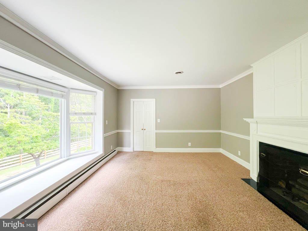 124 Deacon Road Fredericksburg, VA 22405 - Photo 26 of 48 a view of empty room with window and fireplace