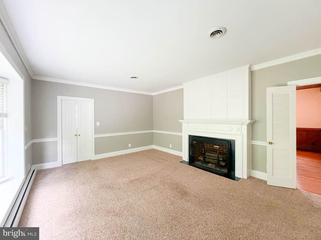 124 Deacon Road Fredericksburg, VA 22405 - Photo 28 of 48 wooden floor fireplace and windows in a room
