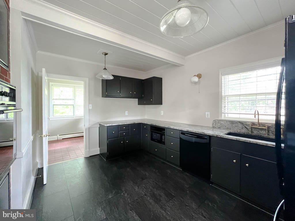 124 Deacon Road Fredericksburg, VA 22405 - Photo 3 of 48 a kitchen with a sink and a stove top oven