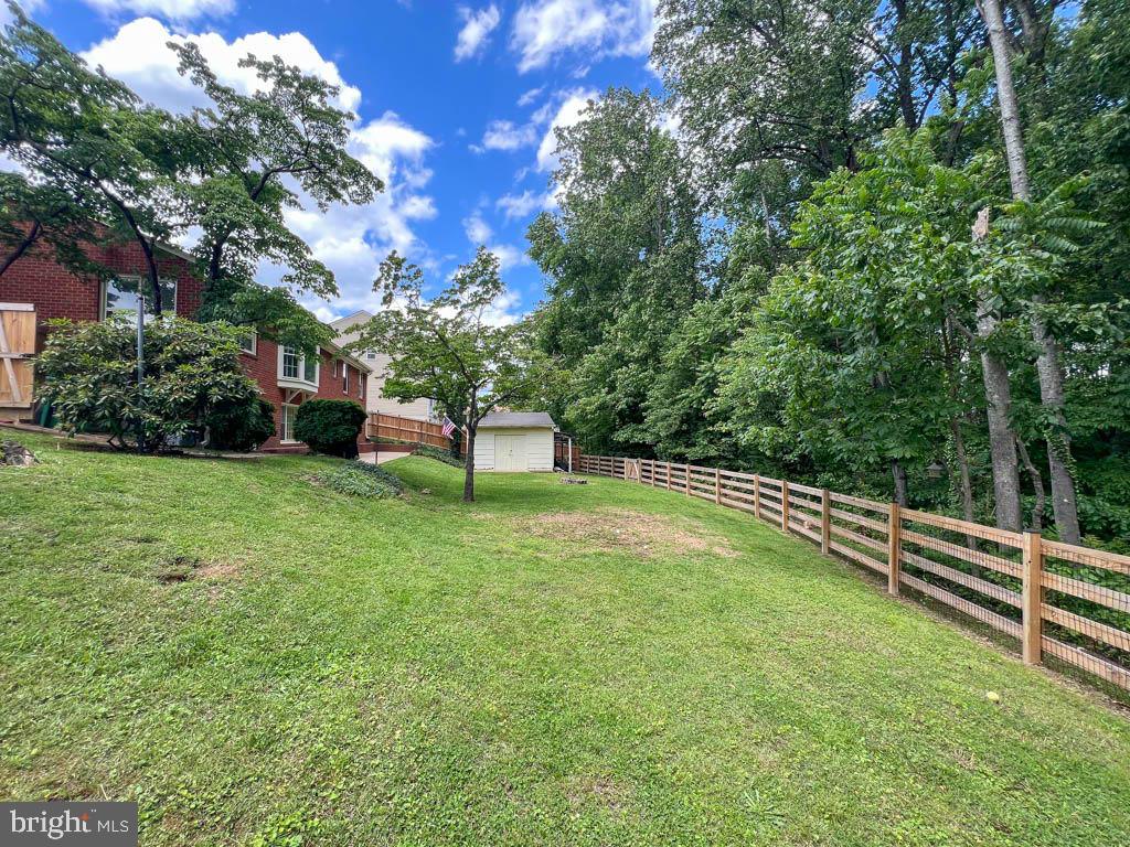 124 Deacon Road Fredericksburg, VA 22405 - Photo 34 of 48 a view of a garden with a bench