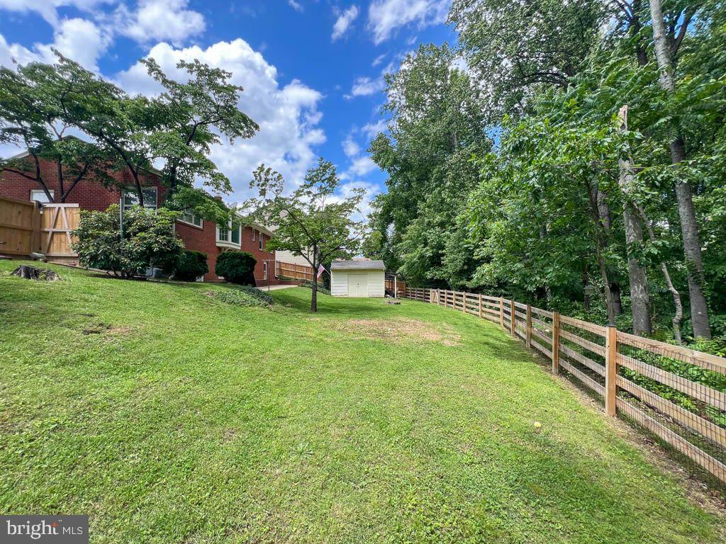 124 Deacon Road Fredericksburg, VA 22405 - Photo 35 of 48 a view of a garden with a bench