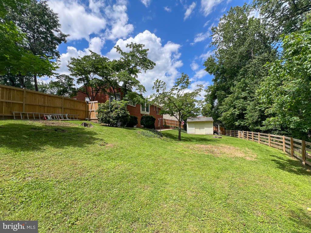 124 Deacon Road Fredericksburg, VA 22405 - Photo 36 of 48 a view of a backyard with a garden
