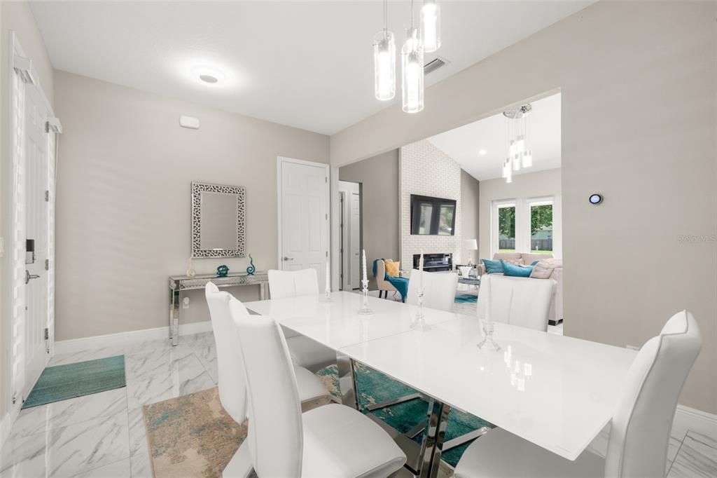 2009 Flower Terrace Sebring, FL 33875 - Photo 14 of 60 a view of a dining room with furniture