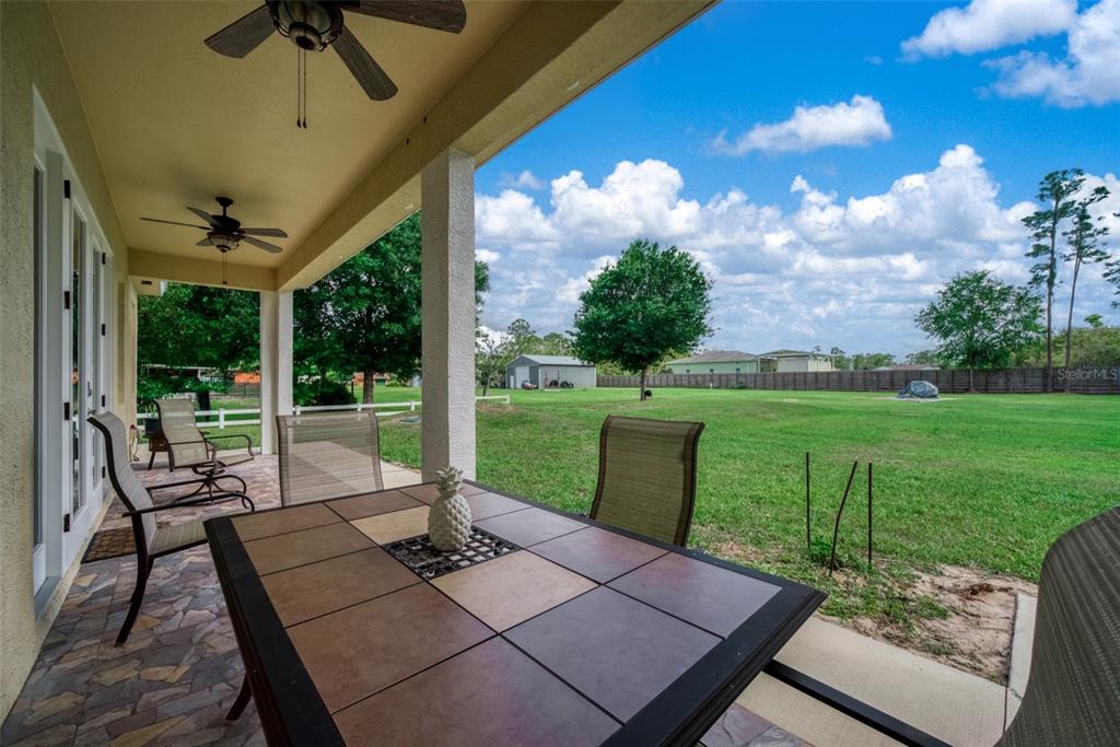 2009 Flower Terrace Sebring, FL 33875 - Photo 43 of 60 a view of a patio with a yard