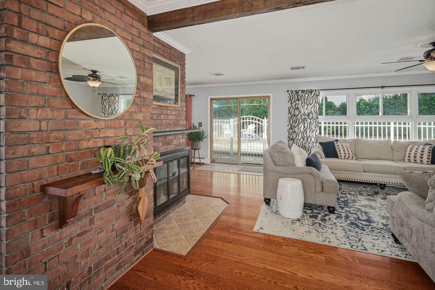 18 Spring Valley Road Levittown, PA 19056 - Photo 8 of 38 Brick firplace