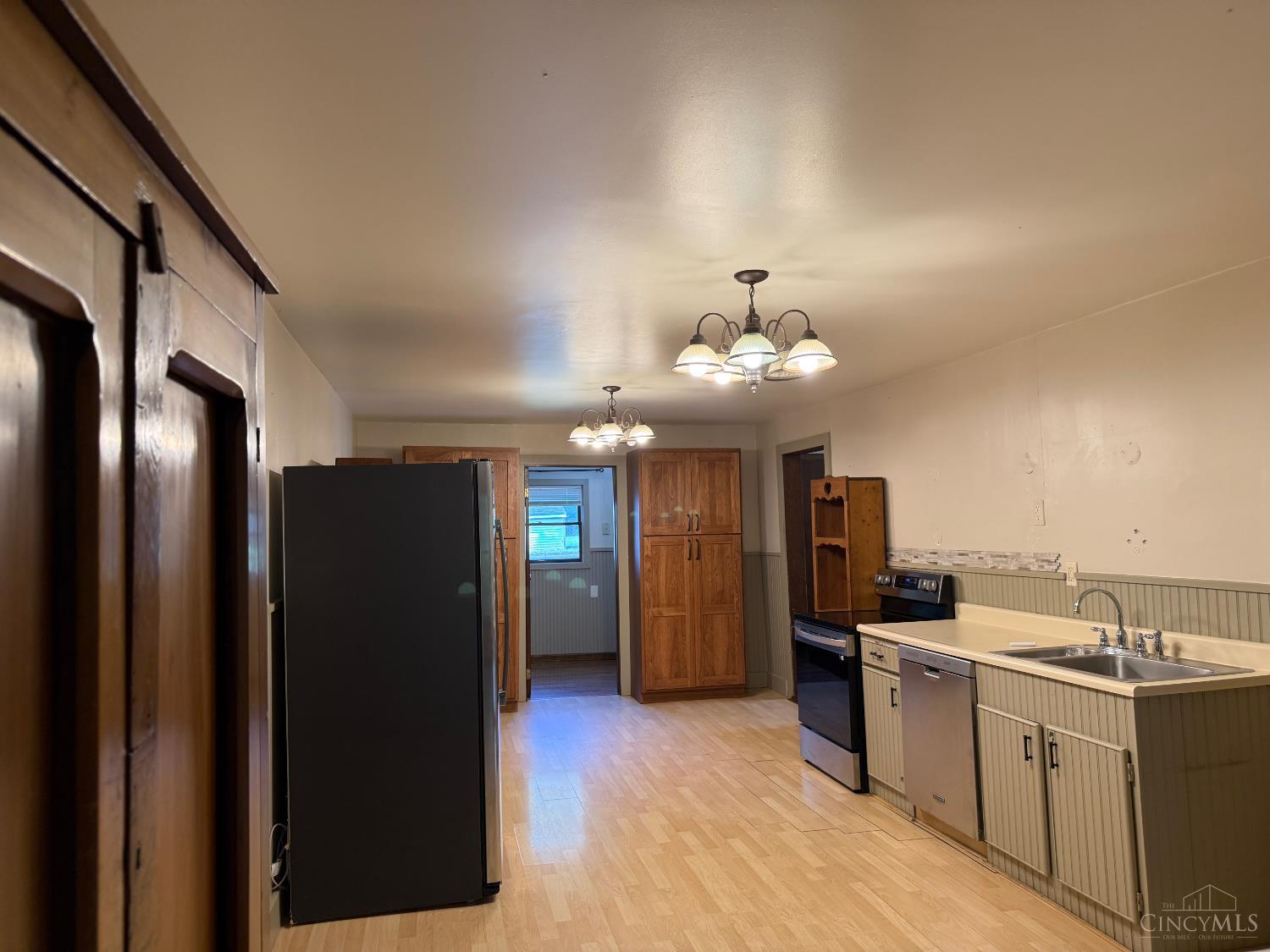 3535 Lewis Road Amelia, OH 45102 - Photo 12 of 46 There is a double stainless steel sink and smooth top range.