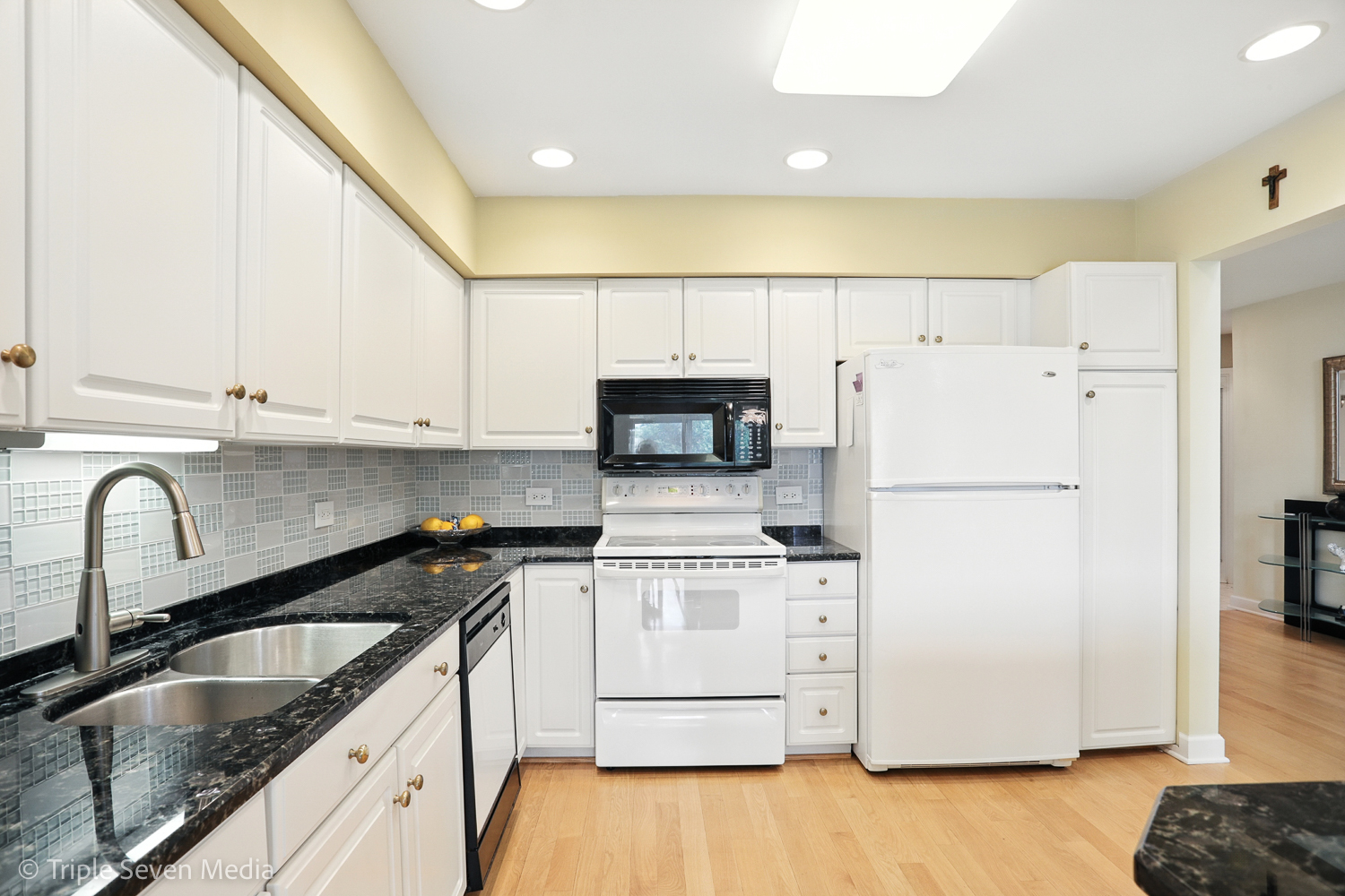 1956 North Silver Lake Road Arlington Heights, IL 60004 - Photo 11 of 33 a kitchen with a sink a stove a refrigerator and cabinets