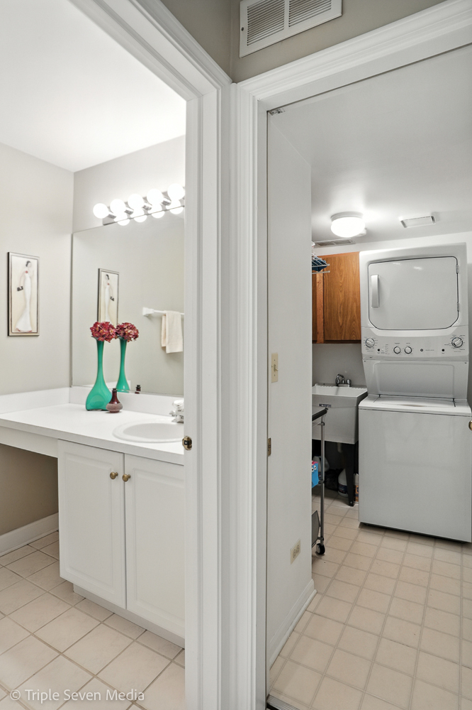 1956 North Silver Lake Road Arlington Heights, IL 60004 - Photo 12 of 33 a bathroom with a sink and a mirror