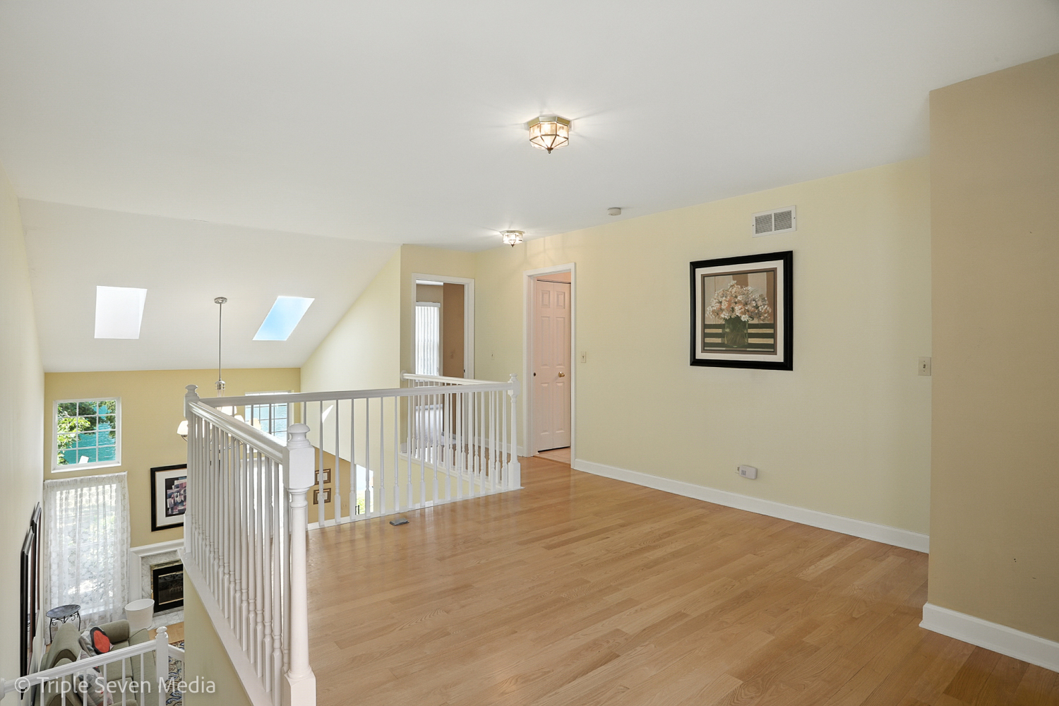 1956 North Silver Lake Road Arlington Heights, IL 60004 - Photo 14 of 33 a view of a livingroom with wooden floor and stairs