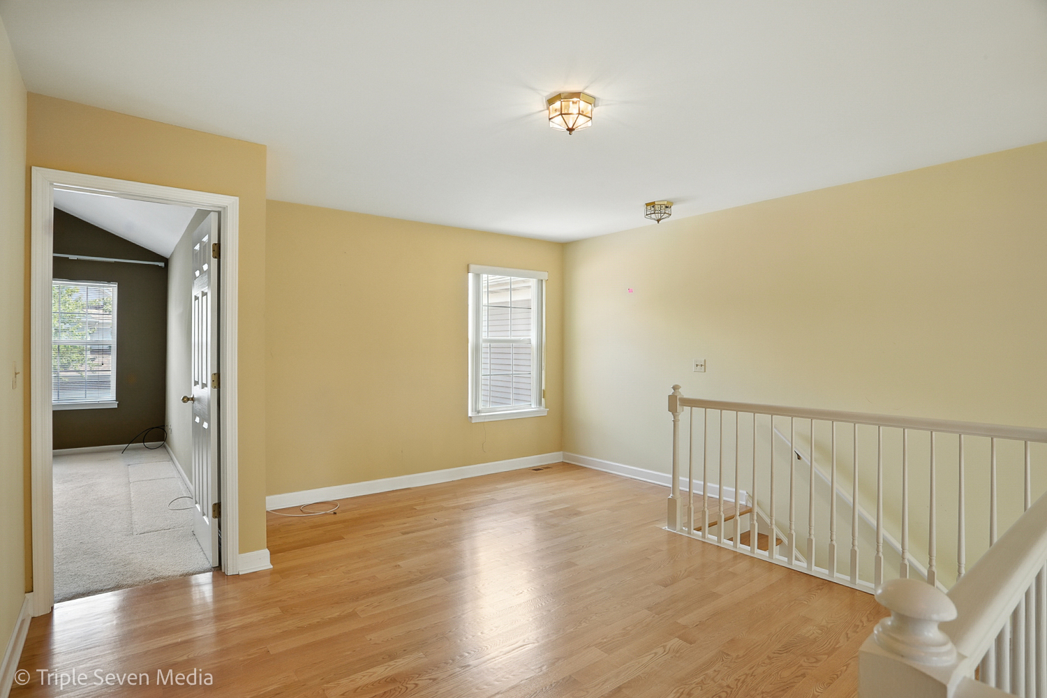 1956 North Silver Lake Road Arlington Heights, IL 60004 - Photo 15 of 33 a view of a hallway with wooden floor