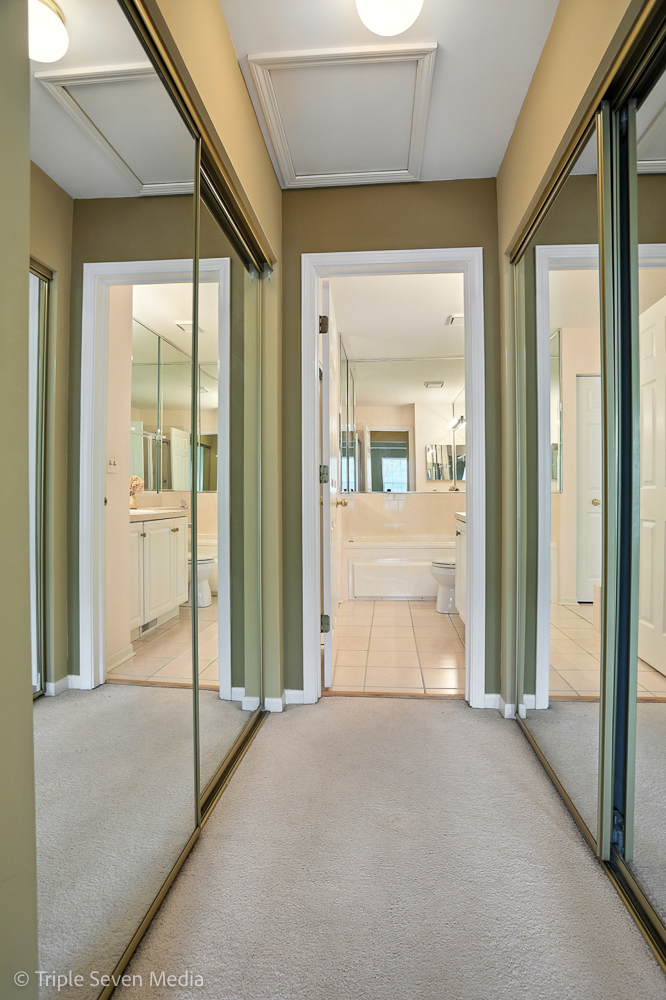 1956 North Silver Lake Road Arlington Heights, IL 60004 - Photo 22 of 33 a view of a hallway with wooden floor and a bathroom