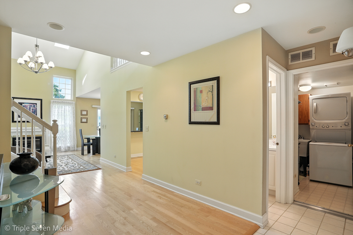 1956 North Silver Lake Road Arlington Heights, IL 60004 - Photo 5 of 33 a view of a hallway with wooden floor and dining room