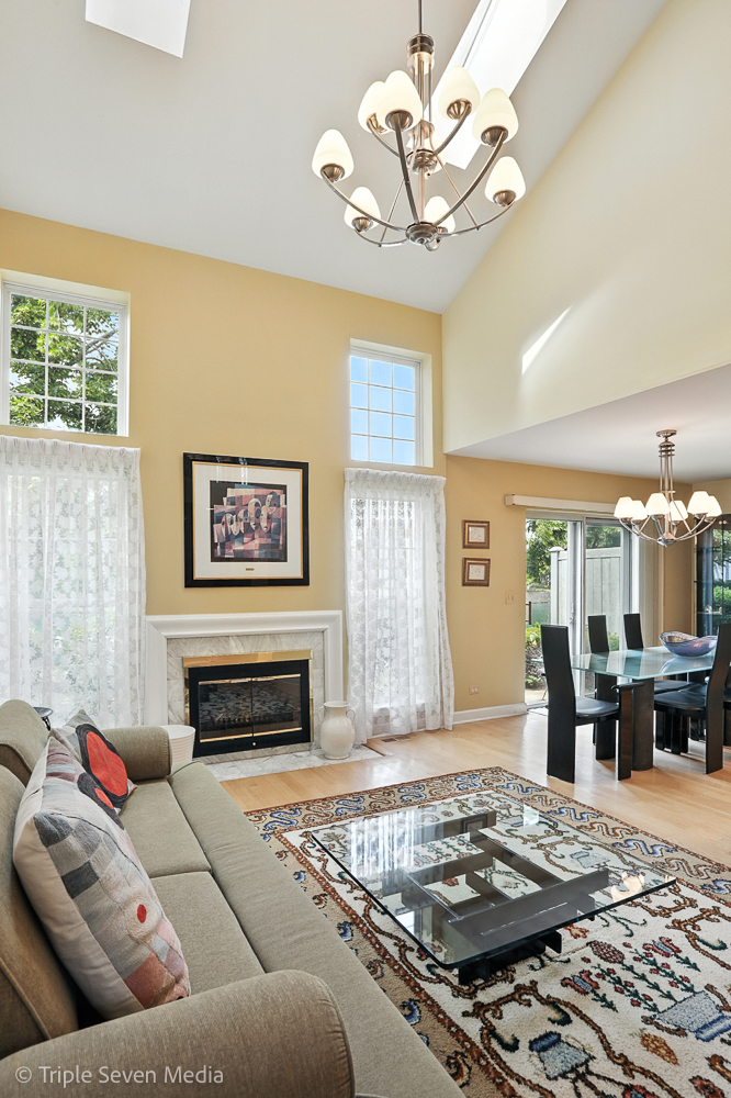 1956 North Silver Lake Road Arlington Heights, IL 60004 - Photo 7 of 33 a living room with furniture and a chandelier