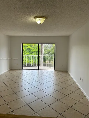 a view of a room with a hallway