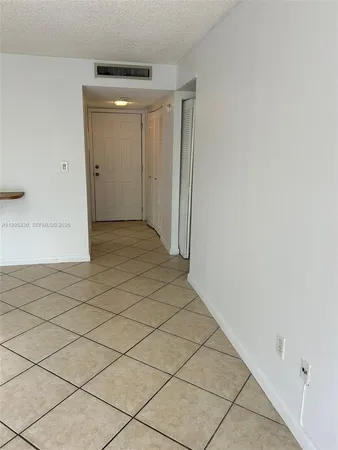 a bathroom with a toilet and a window