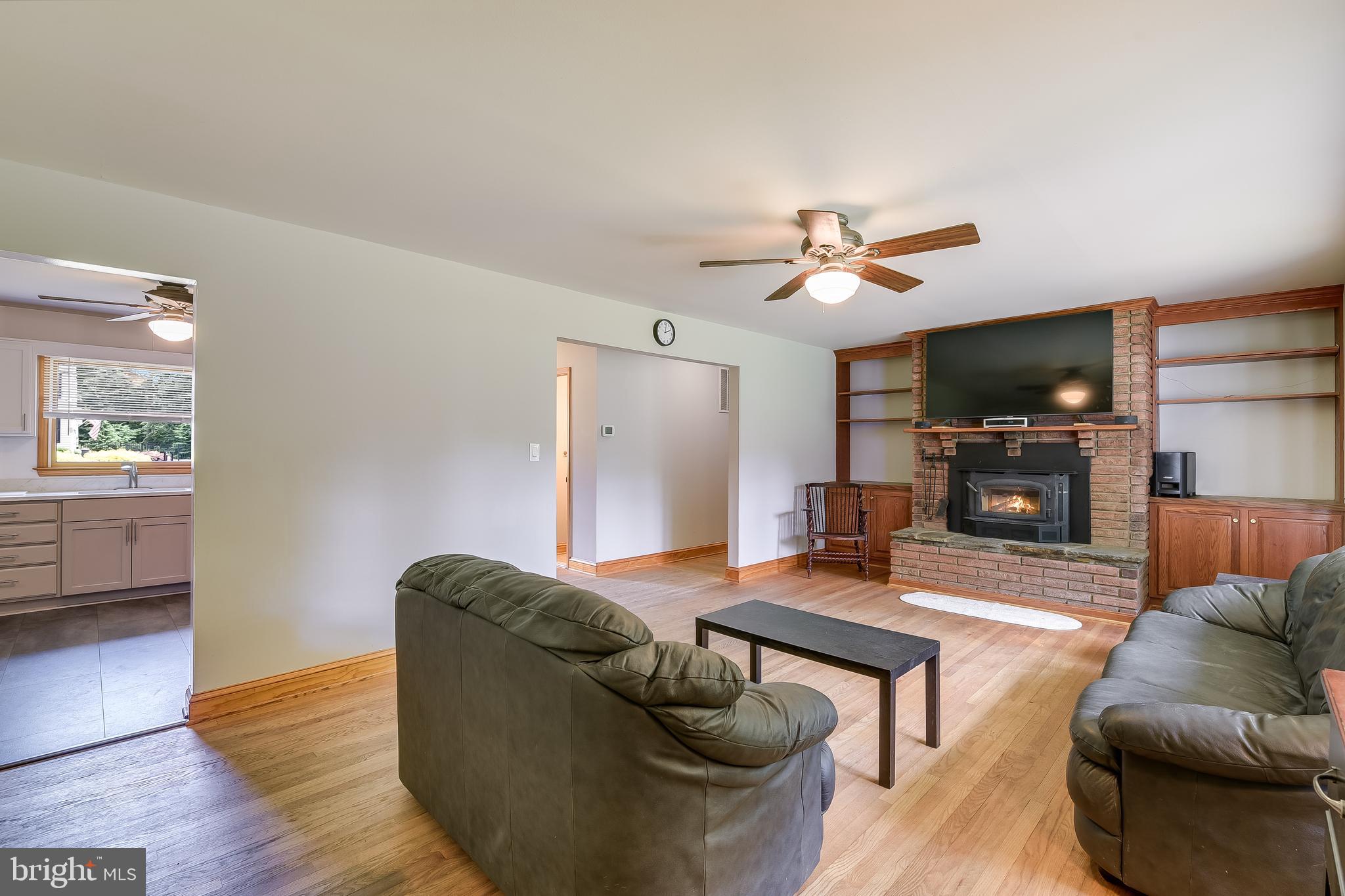 8408 Maryland Road Pasadena, MD 21122 - Photo 21 of 47 OVERSIZED FAMILY WITH WOOD BURNING FIREPLACE