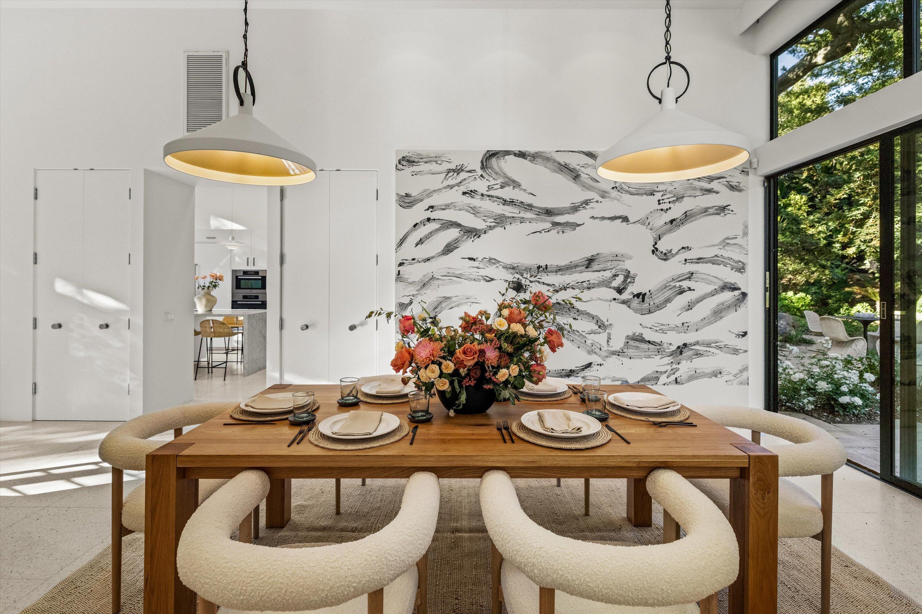 840 Riven Rock Road Montecito, CA 93108 - Photo 14 of 52 a view of a dining room with furniture and chandelier