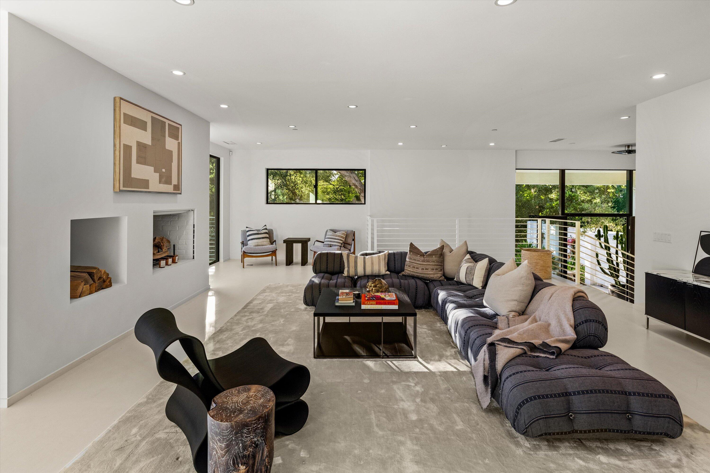 840 Riven Rock Road Montecito, CA 93108 - Photo 16 of 52 a living room with furniture and a flat screen tv