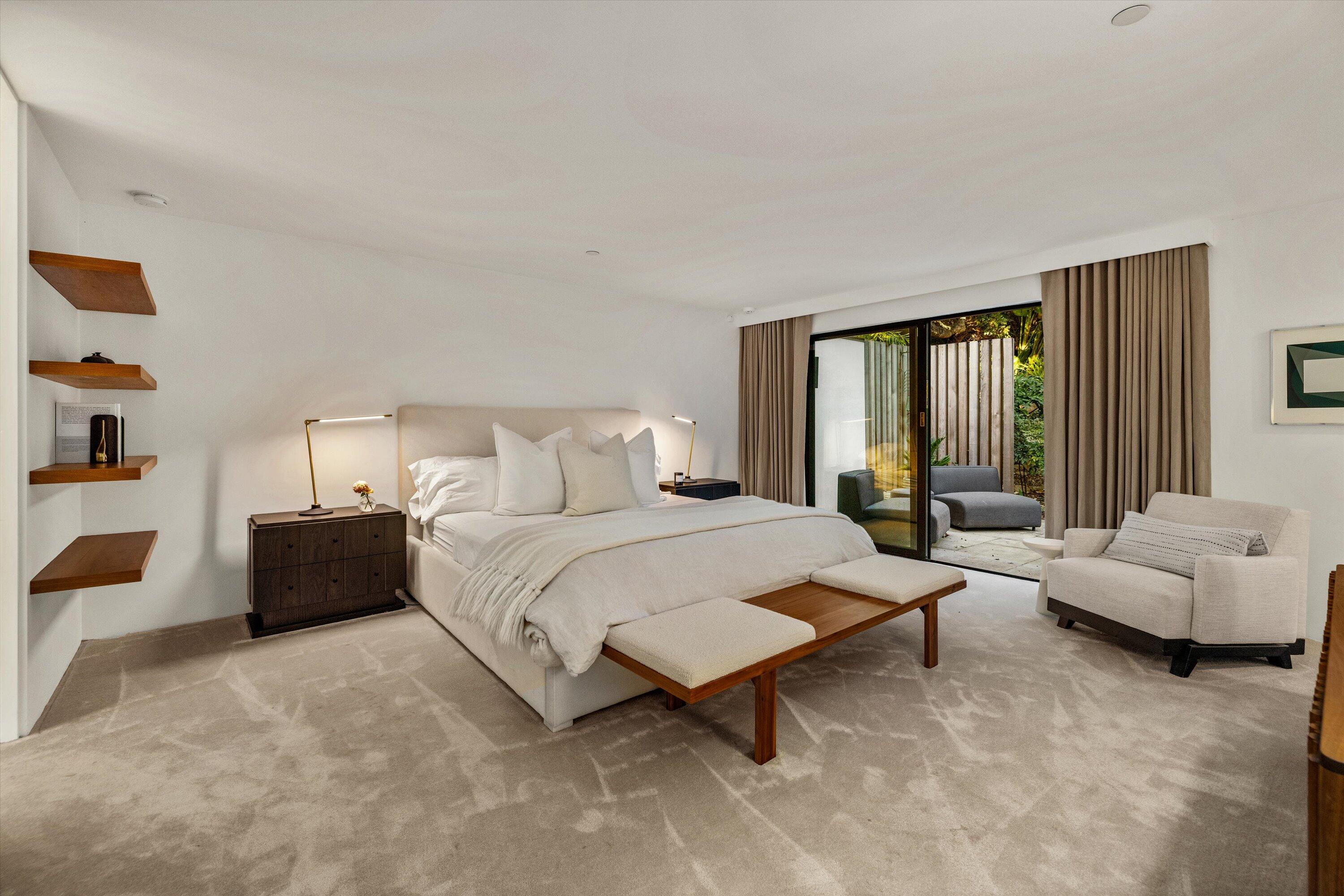 840 Riven Rock Road Montecito, CA 93108 - Photo 17 of 52 a bedroom with a bed and a couch