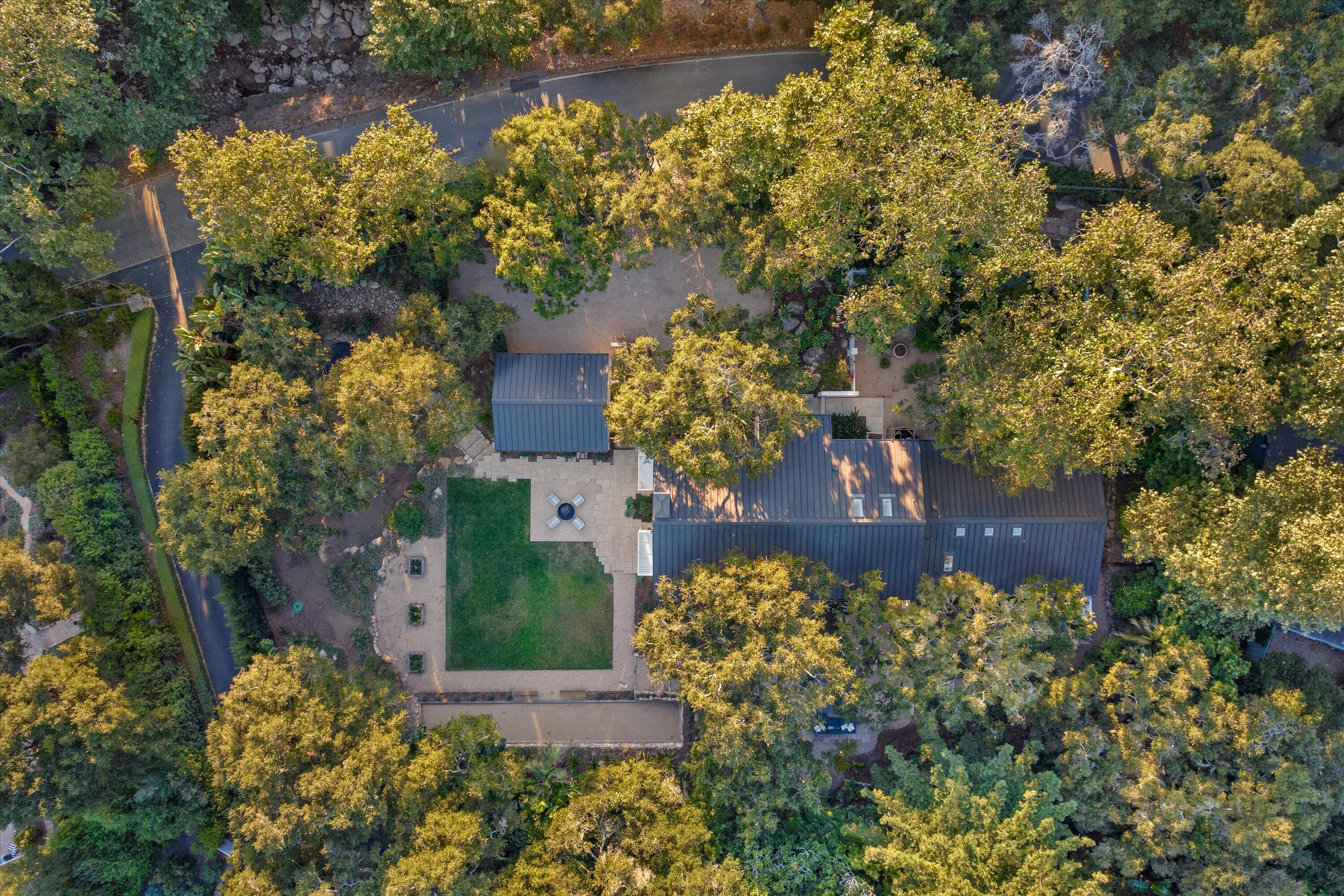 840 Riven Rock Road Montecito, CA 93108 - Photo 50 of 52 front view of a house with a yard and garden